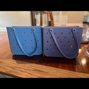 Two medium size bogg bags.